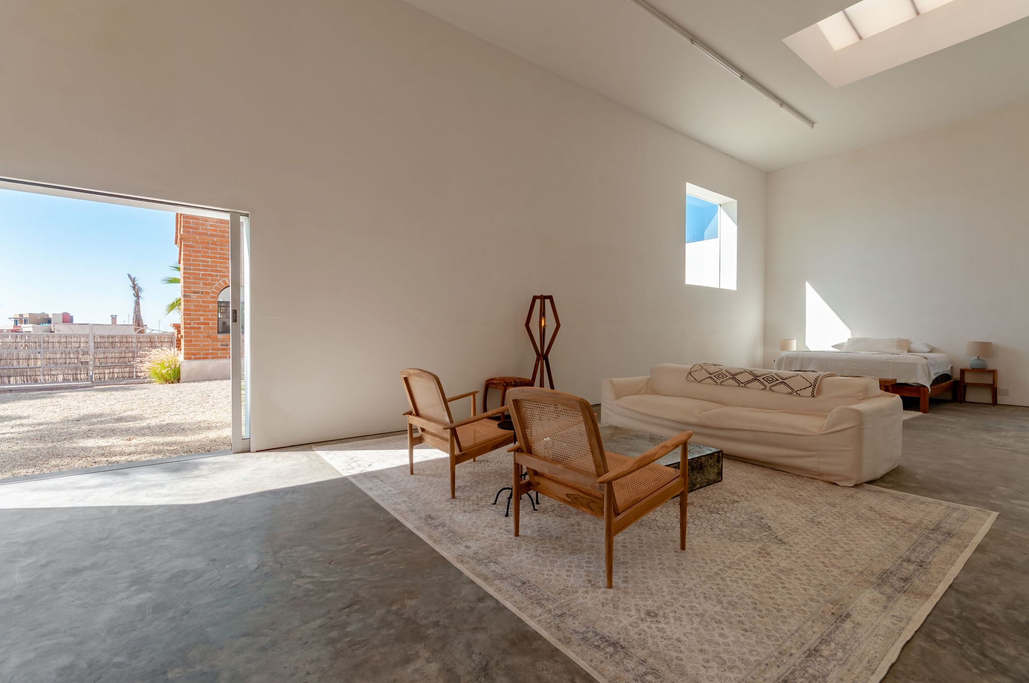 The studio interior at Casa del Arte with work and light